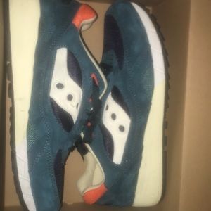 Saucony sneakers orange dark till and white